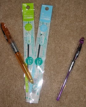 Pentel Slicci Multi-pen and stick pen